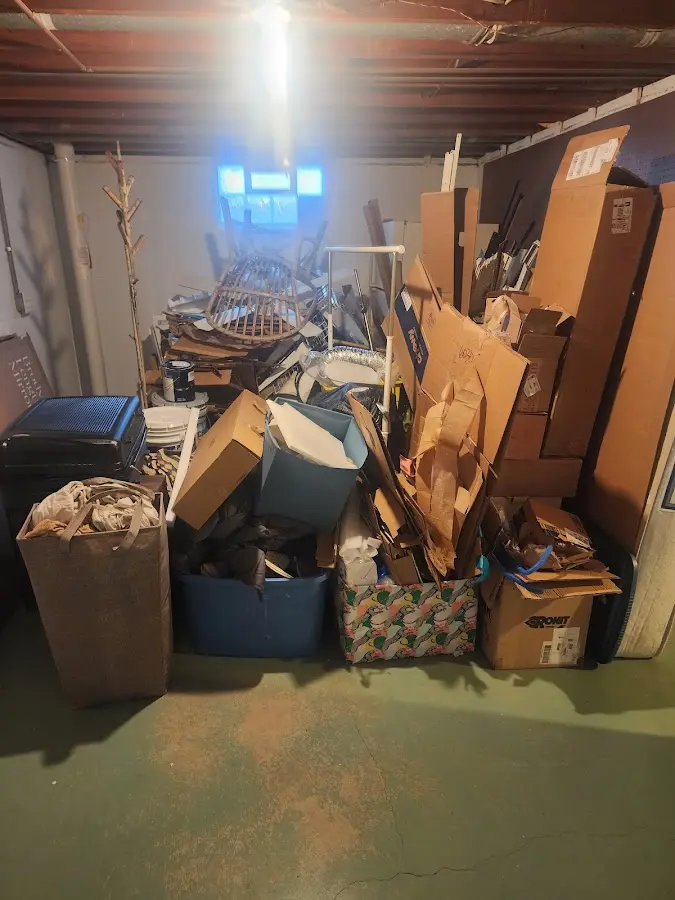 Roll-off dumpster container at job site for Cleanout Dumpster Rental in Westbrook